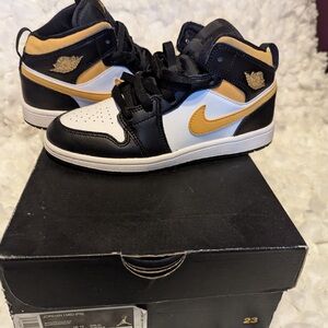 Nike Kids' Black, White, and Gold High-Top Sneakers